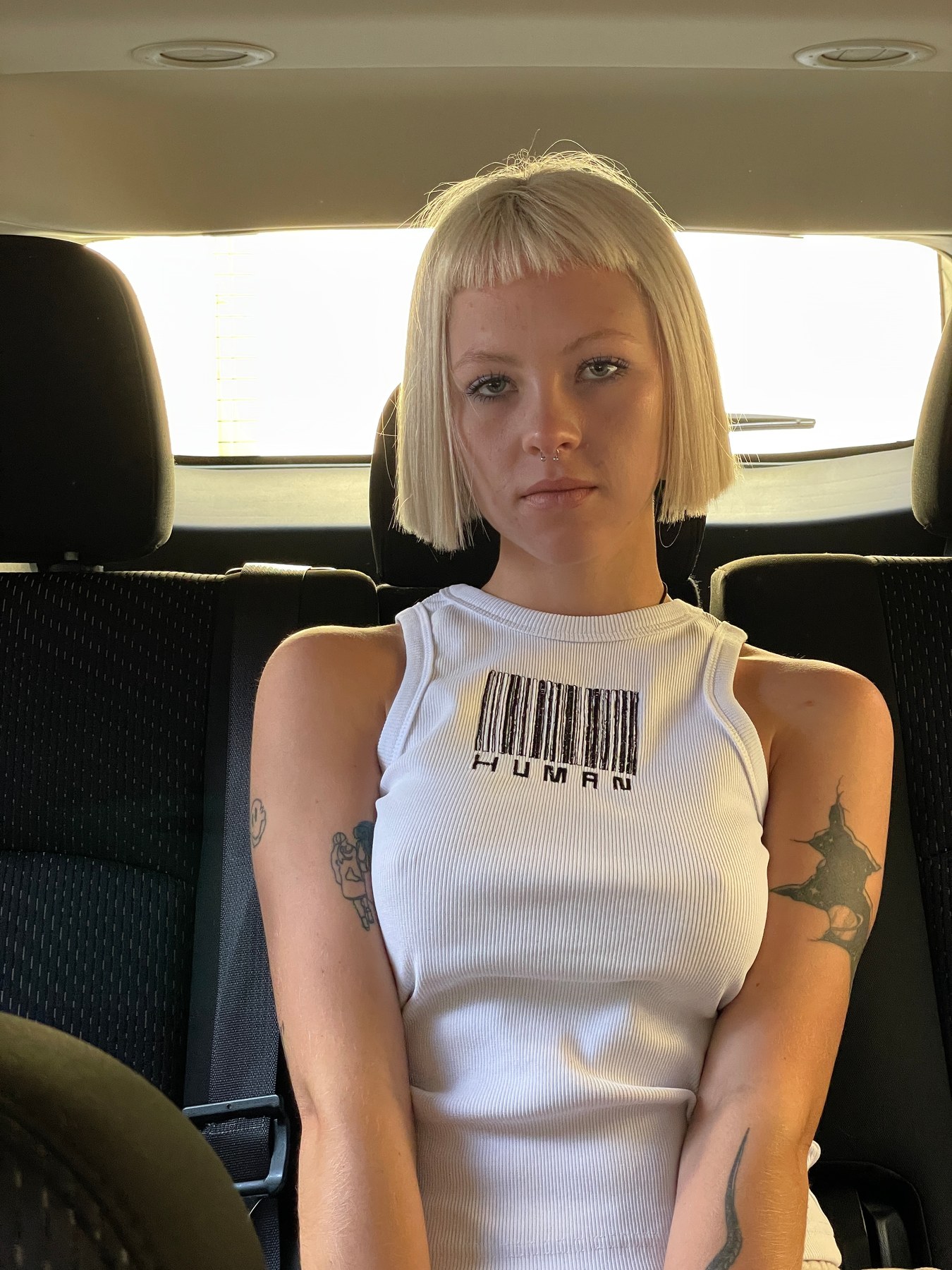 PCD white embroidered tank styled in Vienna